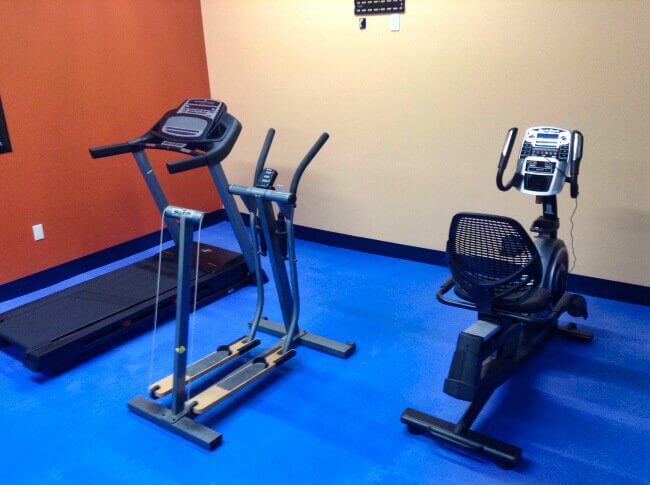 24-hour fitness center with treadmill and exercise bike at Sundowner Park