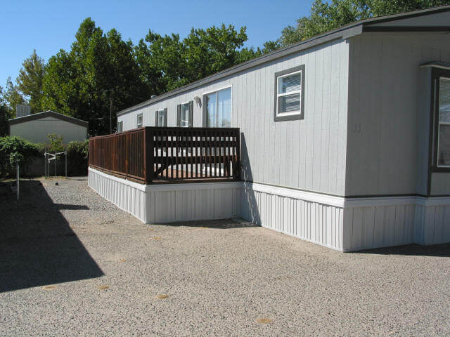 Mobile home with yard space at Sundowner Park
